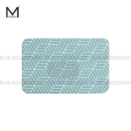 A rectangular printed bathroom floor mat with a geometric pattern in light sea green and white colors